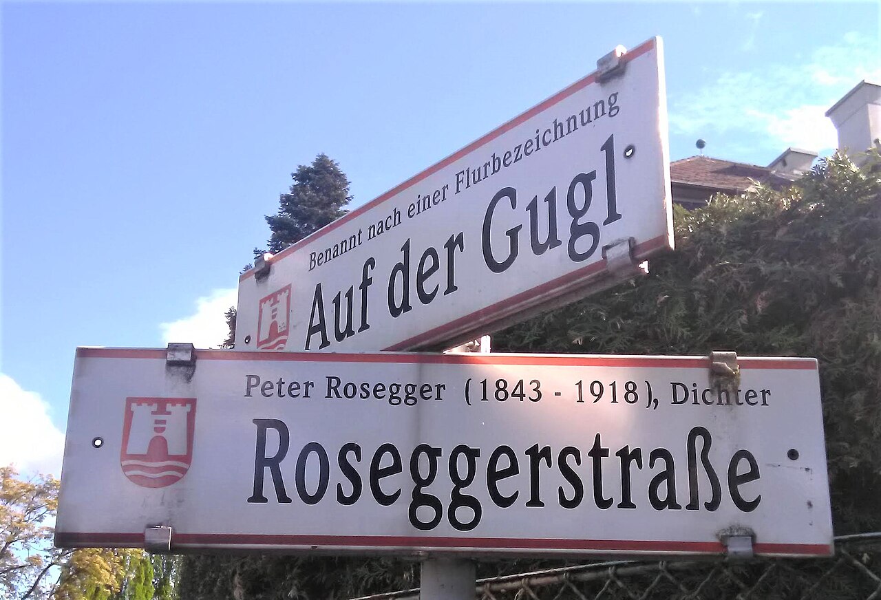Straßenschilder Auf der Gugl und Roseggerstraße in Linz